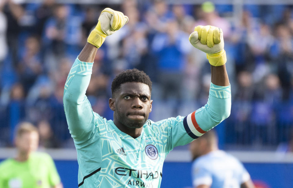 New York City goalkeeper Sean Johnson celebrates his team's victory over the CF Montreal in the Eastern Conference semifinals soccer game in Montreal, Sunday, Oct. 23, 2022. (Paul Chiasson/The Canadian Press via AP)