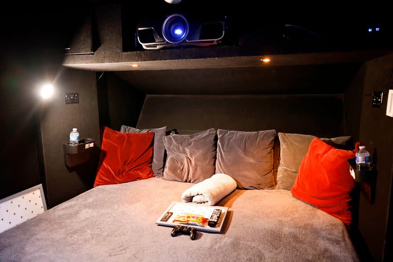 Bed inside a cinema pod which was backed by Gary Neville