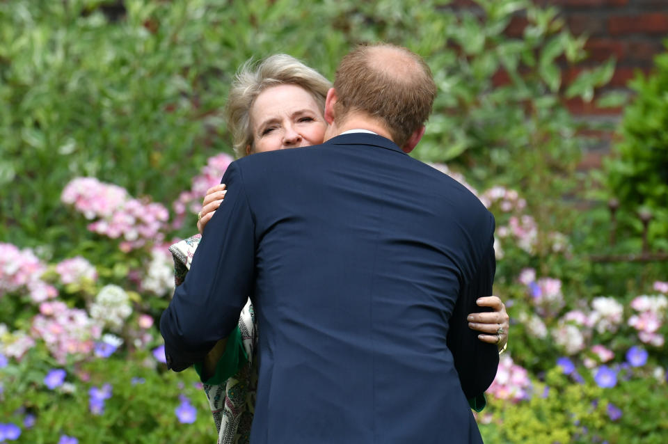 The Duke of Sussex greets Julia Samuel, founder of Child Bereavement UK, ahead of the unveiling of a statue of his mother Diana, Princess of Wales, in the Sunken Garden at Kensington Palace, London, on what would have been her 60th birthday. Picture date: Thursday July 1, 2021.