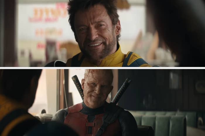 Hugh Jackman as Wolverine and Ryan Reynolds as Deadpool sit in a diner booth and smile at each other in a scene from "Deadpool 3."
