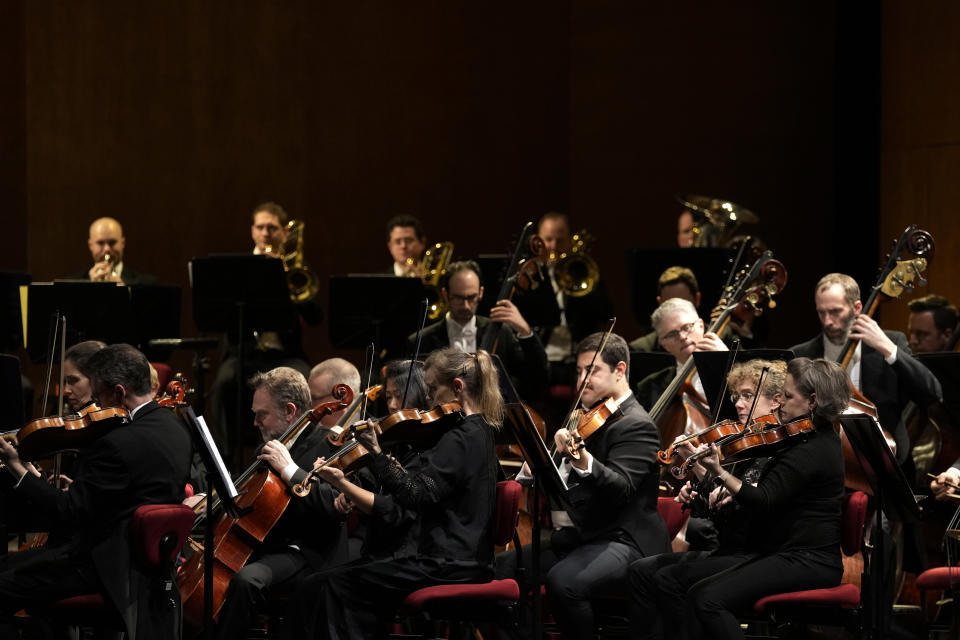 Musicians of the National Symphony Orchestra (NSO) play during a concert at Milan's La Scala theatre, Italy, Monday, Feb. 26, 2024. (AP Photo/Antonio Calanni)