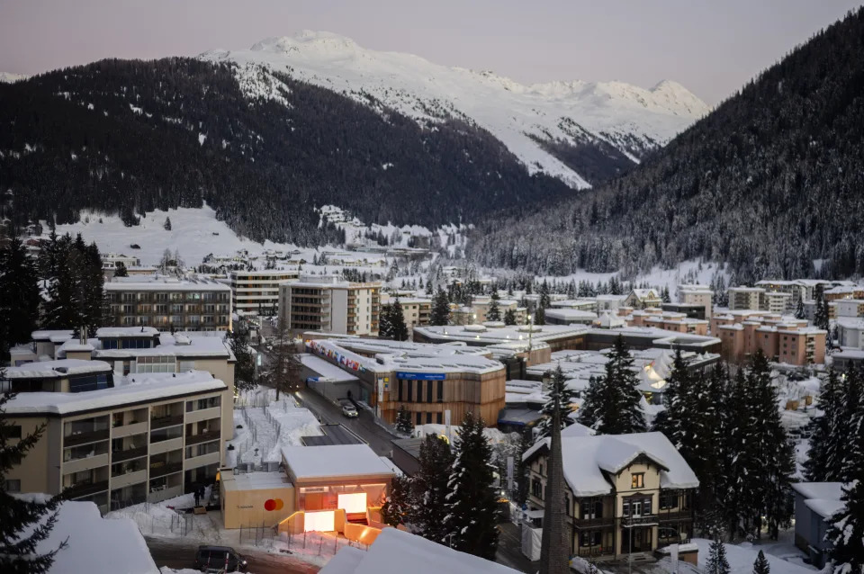 The Davos Congress Center, center, where the World Economic Forum will take place is covered in snow in Davos, Switzerland, Saturday, Jan. 13, 2024. The annual meeting of the World Economic Forum is taking place in Davos from Jan. 15 until Jan. 19, 2024. (AP Photo/Markus Schreiber)