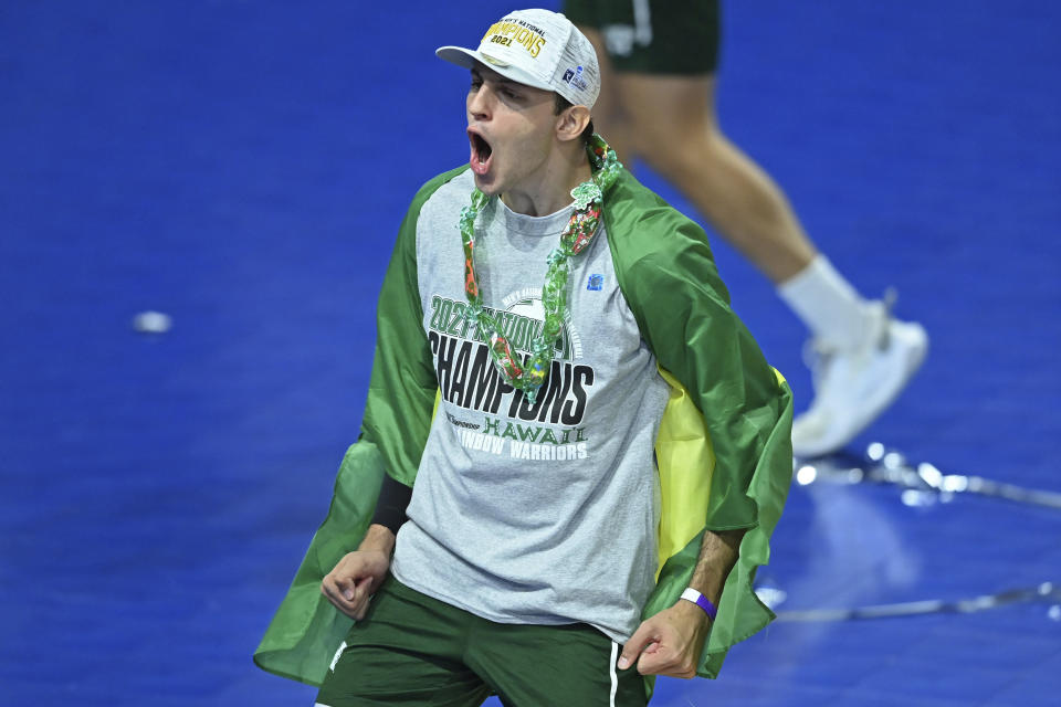 Hawaii's Guilherme Voss celebrates after Hawaii defeated BYU in the final of the NCAA men's volleyball tournament Saturday, May 8, 2021, in Columbus, Ohio. (AP Photo/David Dermer)