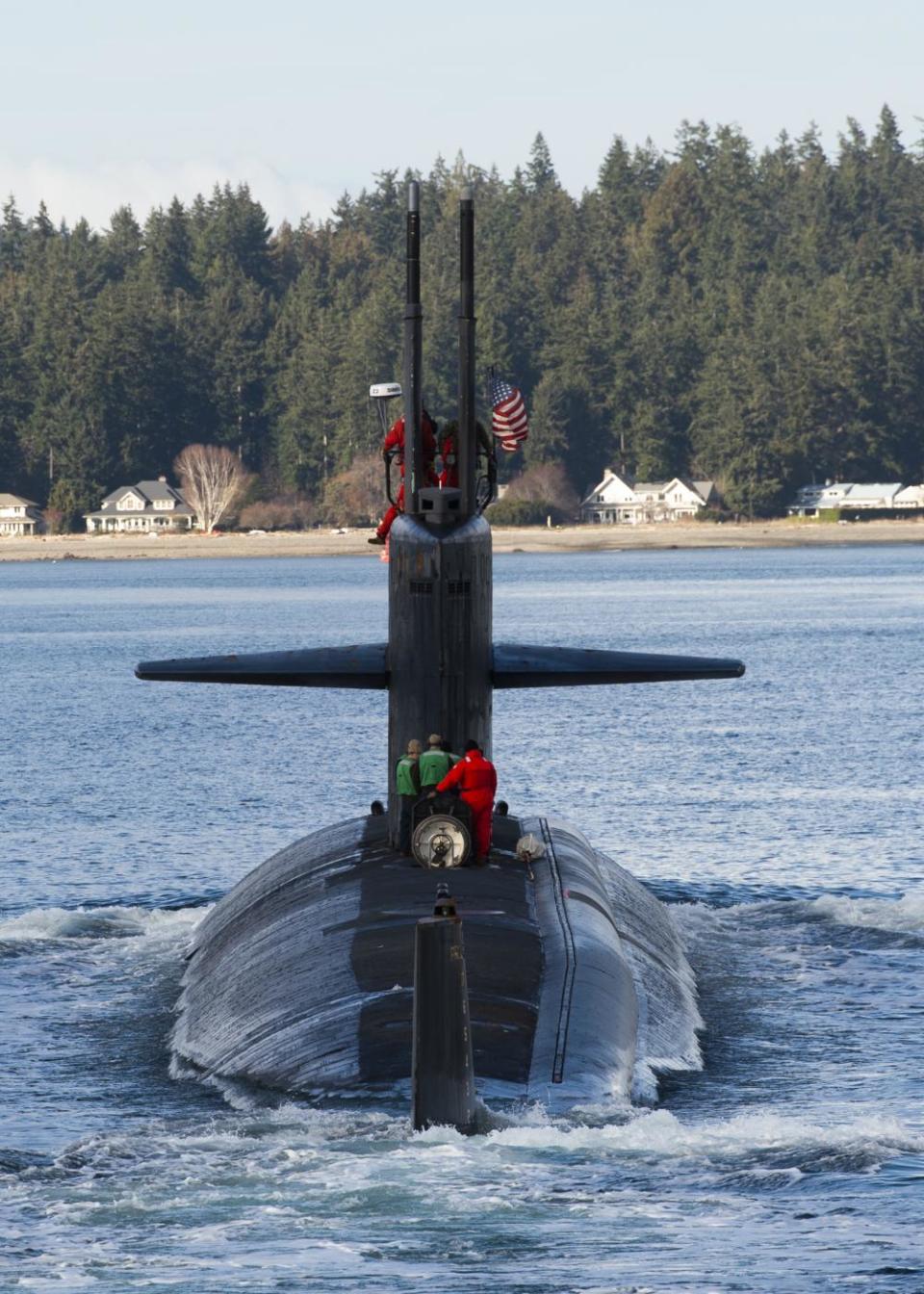 The Los Angeles-class fast-attack submarine USS Key West (SSN 722) transits the Puget Sound before mooring at Bremerton on Feb. 10.