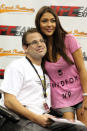 HOUSTON, TX - OCTOBER 08: UFC Octagon Girl Arianny Celeste poses for photos with fans at the UFC Fan Expo inside the George R. Brown Convention Center on October 8, 2011 in Houston, Texas.