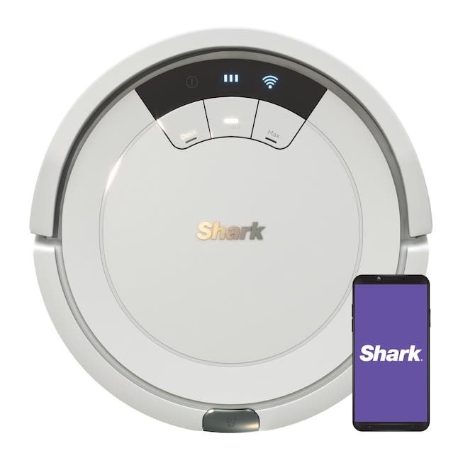 A robo vacuum and iphone displaying the app