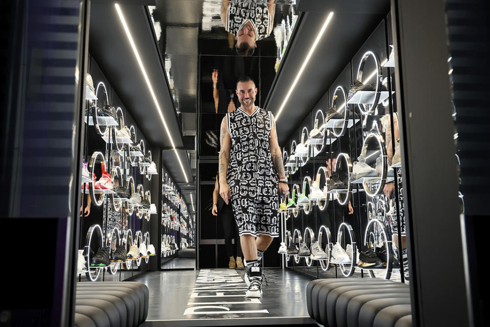 Designer Philipp Plein inside his new Plein Sport mobile pop-up store. - Credit: Getty Images for Philipp Plein