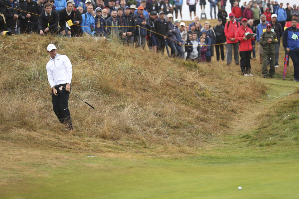 Rory McIlroy of Northern Ireland watches his shot on the 2nd hole during the second round of the British Open Golf Championship in Carnoustie, Scotland, Friday July 20, 2018. (AP Photo/Peter Morrison)