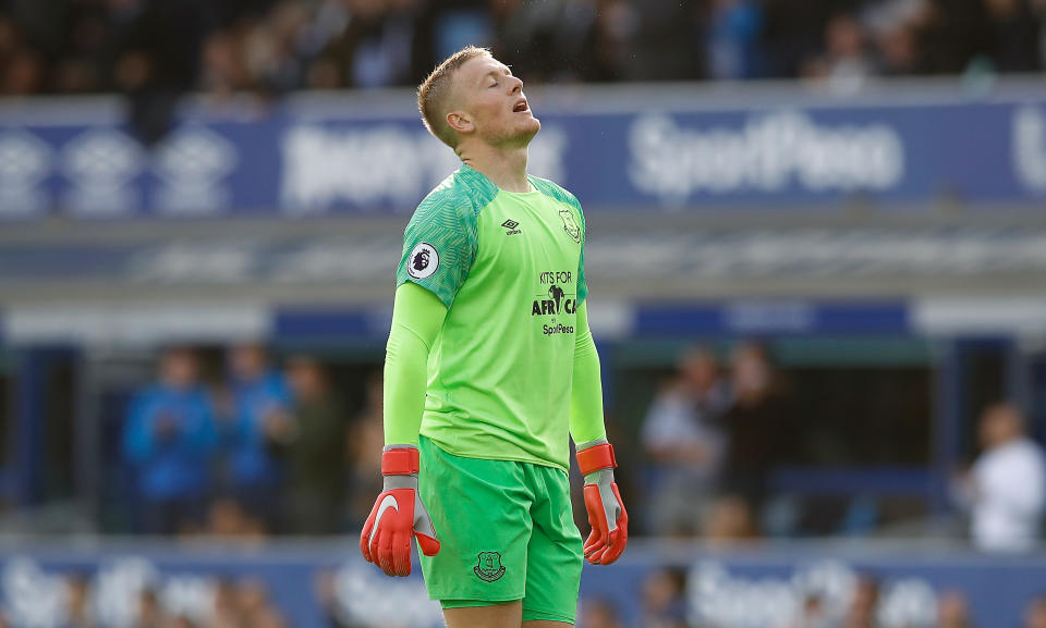 Jordan Pickford reacts after his mistake cost Everton a second goal at Goodison Park