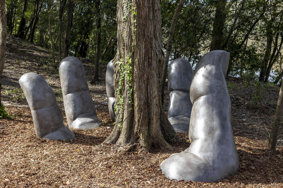 "The Caring Hand," by Eva Oertli and Beat Huber, concrete, 2014, during a media tour of Equal Justice Initiative's new Freedom Monument Sculpture Park, Tuesday, March 12, 2024, in Montgomery, Ala. (AP Photo/Vasha Hunt)