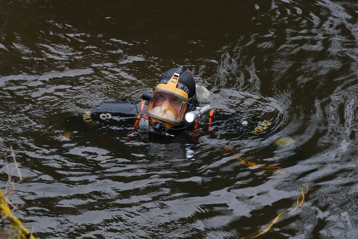 A diver searches in the River Wyre, in St Michael’s on Wyre, Lancashire(Peter Byrne/PA) (PA Wire)
