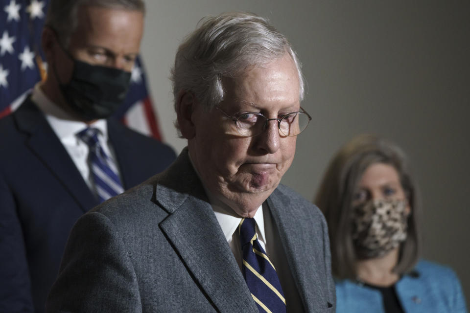 Senate Majority Leader Mitch McConnell, R-Ky., arrives to talk to reporters after a Republican Conference luncheon, on Capitol Hill in Washington, Tuesday, Nov. 17, 2020. (AP Photo/J. Scott Applewhite)