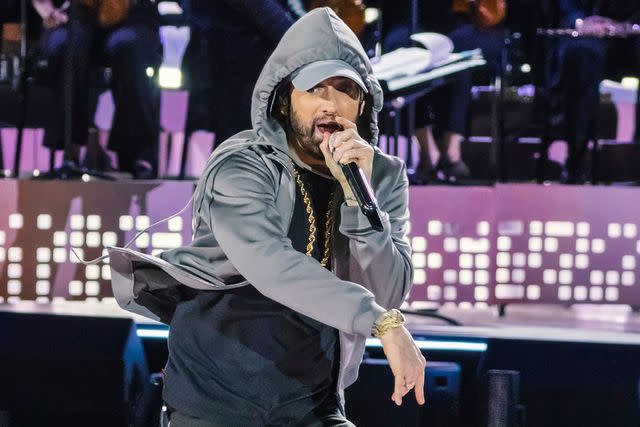 <p>John D Shearer/Shutterstock</p> Eminem performs at the Michigan Central Station opening concert in Detroit on June 6, 2024