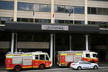 Emergency service workers at the scene of a chemical leak at the Pullman Hotel in Sydney, Australia, September 19, 2018. AAP/Joel Carrett/via REUTERS