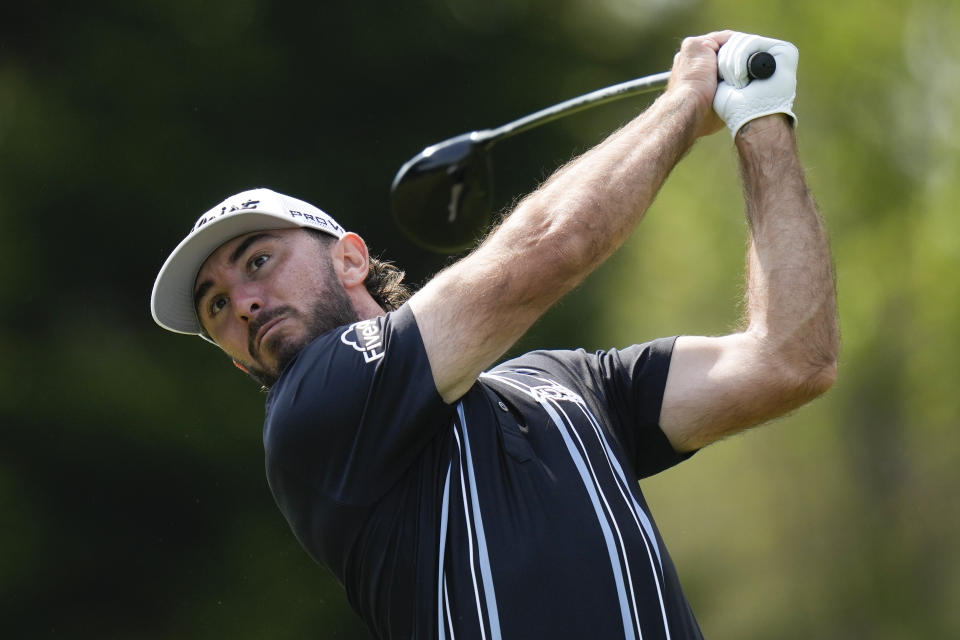 Max Homa watches his tee shot on the 17th hole during the second round of the PGA Championship golf tournament at Oak Hill Country Club on Friday, May 19, 2023, in Pittsford, N.Y. (AP Photo/Seth Wenig)