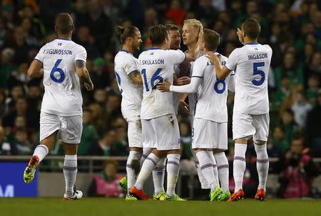 Football Soccer - Republic of Ireland v Iceland - International Friendly - Aviva Stadium, Dublin, Republic of Ireland - 28/3/17 Iceland's Hordur Bjorgvin Magnusson celebrates scoring their first goal with team mates Action Images via Reuters / Peter Cziborra Livepic