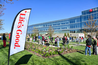 Attendees plant native species at the new pollinator garden at Life's Good Earth Day Community Fair, Monday, April 22, 2024, at the LG Electronics North American Innovation Campus in Englewood Cliffs, NJ.  Earning a Certified Wildlife Habitat® certification through the NWF, LG's garden is outfitted with native plants, designed to attract a mixture of pollinators, such as bees, butterflies, moths, and beetles, which will encourage biodiversity, plant growth, clean air, and support wildlife.  (Diane Bondareff/AP Images for LG Electronics)