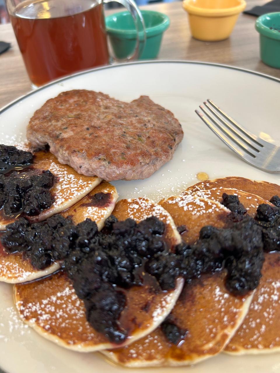 Silver dollar pancakes with Ohio maple syrup, elderberry compote and sausage at TUSK diner in Barberton.