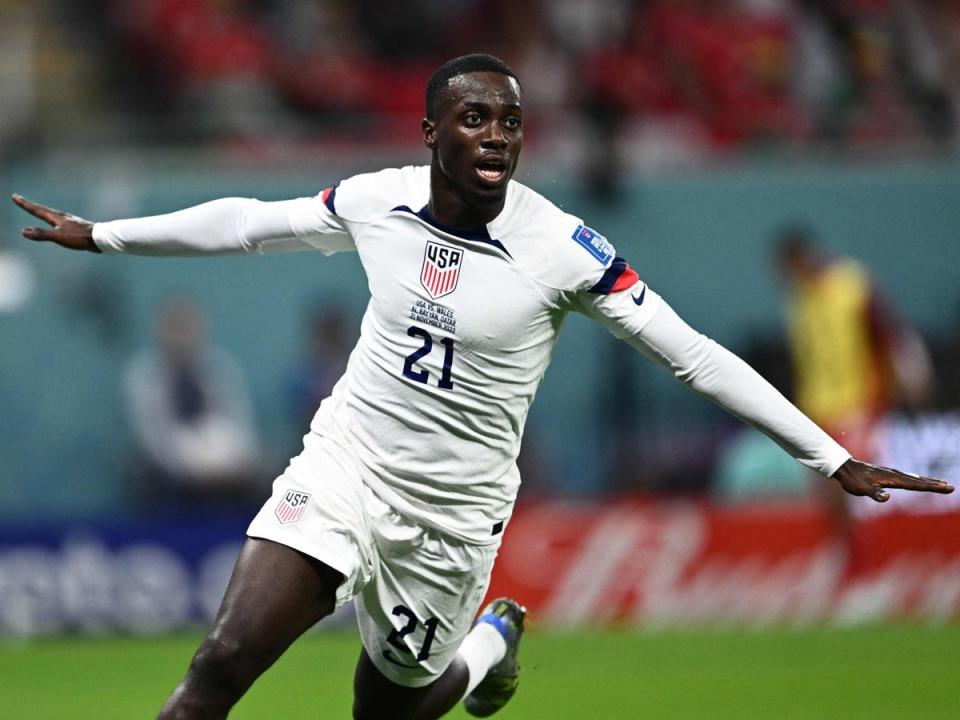 Timothy Weah celebrates giving USA the lead against Wales at the World Cup (AFP via Getty Images)