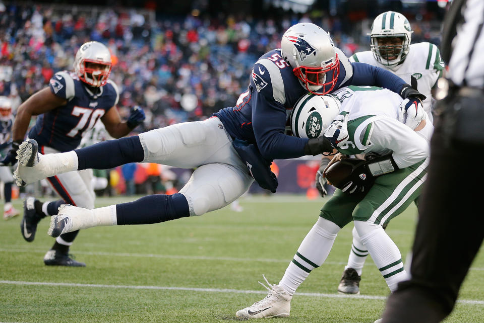 <p>Eric Lee #55 of the New England Patriots sacks Bryce Petty #9 of the New York Jets in the end zone for a safety during the fourth quarter at Gillette Stadium on December 31, 2017 in Foxboro, Massachusetts. (Photo by Jim Rogash/Getty Images) </p>