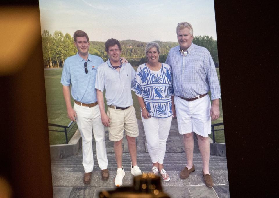 a family photo of buster, paul, maggie and alex murdaugh from the murder trial of alex murdaugh at the colleton county courthouse in south carolina