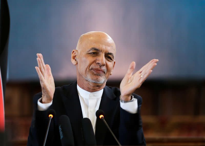 FILE PHOTO: Afghanistan's President Ashraf Ghani gestures during celebrations to mark Afghan New Year (Newroz), in Kabul