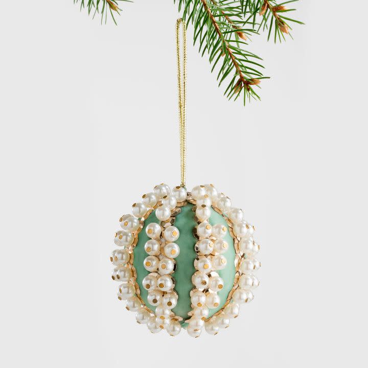 <p><a href="https://go.redirectingat.com?id=74968X1596630&url=https%3A%2F%2Fwww.joannabuchanan.com%2Fproducts%2Fpearl-and-velvet-ball-ornament-mint-green&sref=https%3A%2F%2Fwww.veranda.com%2Fshopping%2Fg41497590%2Fluxury-christmas-decorating-ideas%2F" rel="nofollow noopener" target="_blank" data-ylk="slk:Shop Now;elm:context_link;itc:0;sec:content-canvas" class="link rapid-noclick-resp">Shop Now</a></p><p>Pearl and Velvet Ball Ornament</p><p>$35.00</p>