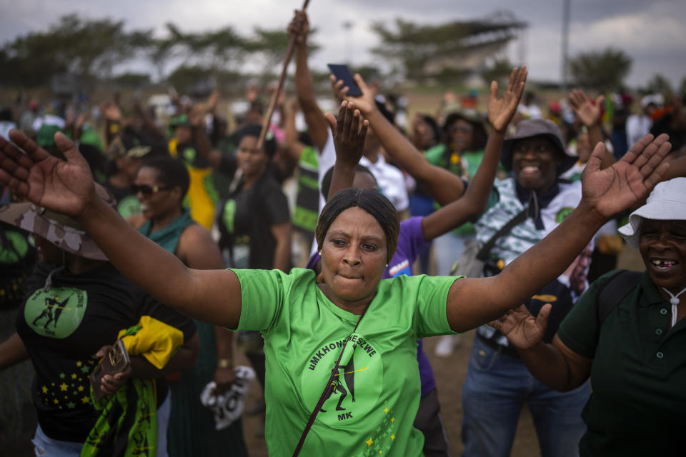 Supporters of Ukhonto weSizwe party react during an election meeting in Mpumalanga, near Durban, South Africa, Saturday, May 25, 2024, ahead of the 2024 general elections scheduled for May 29. (AP Photo/Emilio Morenatti)