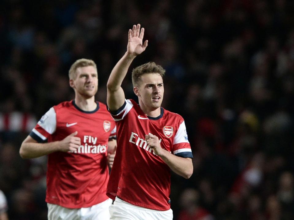 Arsenal's Ramsey celebrates after scoring a goal against Liverpool during their English Premier League soccer match at the Emirates stadium in London