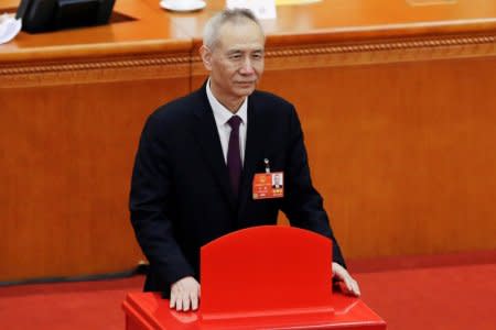 Liu He, vice chairman of the National Development and Reform Commission (NDRC), pauses after casting his ballot during the seventh plenary session of the National People's Congress (NPC) at the Great Hall of the People in Beijing, China March 19, 2018.  REUTERS/Jason Lee