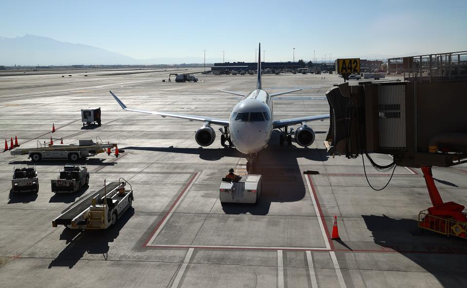A plane is parked at Salt Lake City International Airport in Salt Lake City on Tuesday, Oct. 31, 2023. | Kristin Murphy, Deseret News