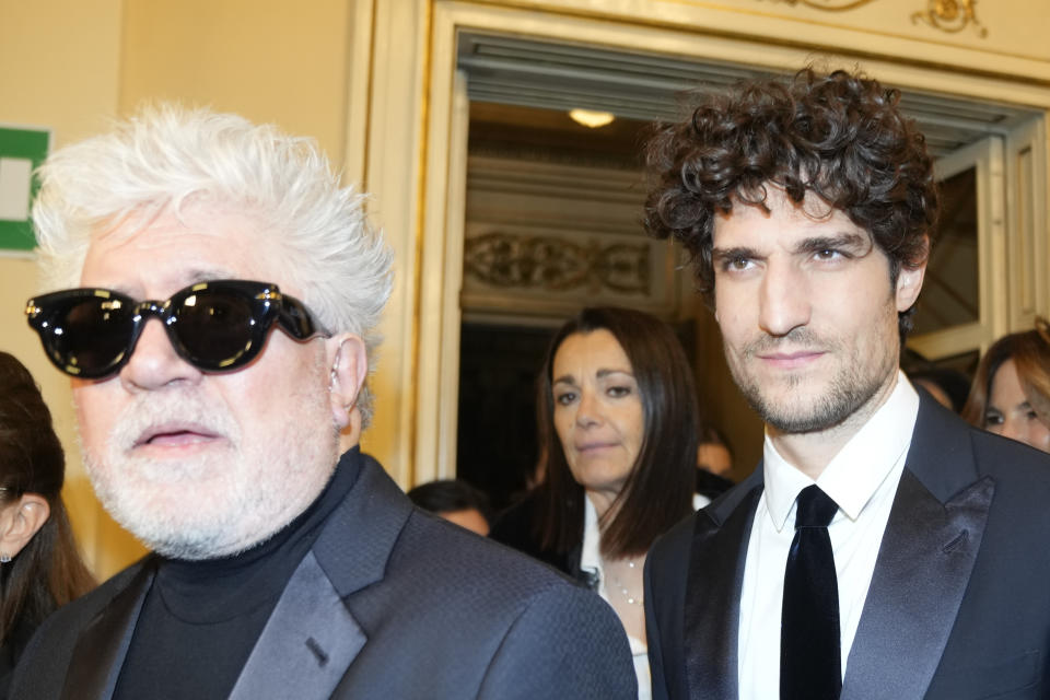 Spanish Director Pedro Almodovar, left, and French Actor Louis Garrel arrive to attend La Scala opera house's gala season opener, Giuseppe Verdi's opera 'Don Carlo' at the Milan La Scala theater, Italy, Thursday Dec. 7, 2023. The season-opener Thursday, held each year on the Milan feast day St. Ambrose, is considered one of the highlights of the European cultural calendar. (AP Photo/Luca Bruno)