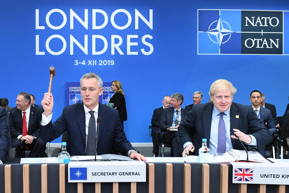 Jens Stoltenberg, the Secretary General of Nato (left) sits with Prime Minister Boris Johnson during the annual Nato heads of government summit at The Grove hotel in Watford, Hertfordshire.