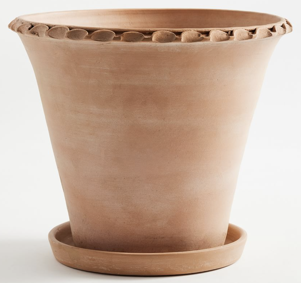 <p><a href="https://go.redirectingat.com?id=74968X1596630&url=https%3A%2F%2Fwww.potterybarn.com%2Fproducts%2Fprovence-scalloped-edge-planter-terra-cotta%2F&sref=https%3A%2F%2F" rel="nofollow noopener" target="_blank" data-ylk="slk:Shop Now;elm:context_link;itc:0;sec:content-canvas" class="link ">Shop Now</a></p><p>Provence Scalloped Edge Outdoor Planters</p><p>potterybarn.com</p><p>$28.99</p><span class="copyright">Pottery Barn</span>