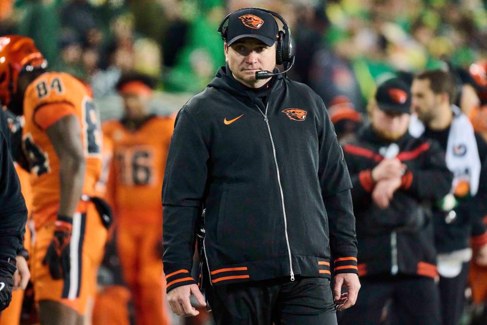 Oregon State Beavers head coach Jonathan Smith watches a player being attended to during the second half against the Oregon Ducks at Autzen Stadium in Eugene, Oregon, Nov. 24, 2023.