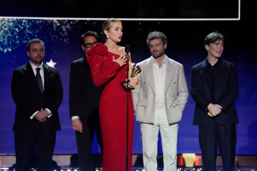 David Krumholtz, from left, Robert Downey Jr., Emily Blunt, center, Alden Ehrenreich, and Cillian Murphy accept the award for best ensemble for “Oppenheimer” during the 29th Critics Choice Awards on Sunday, Jan. 14, 2024, at the Barker Hangar in Santa Monica, Calif. (AP Photo/Chris Pizzello)