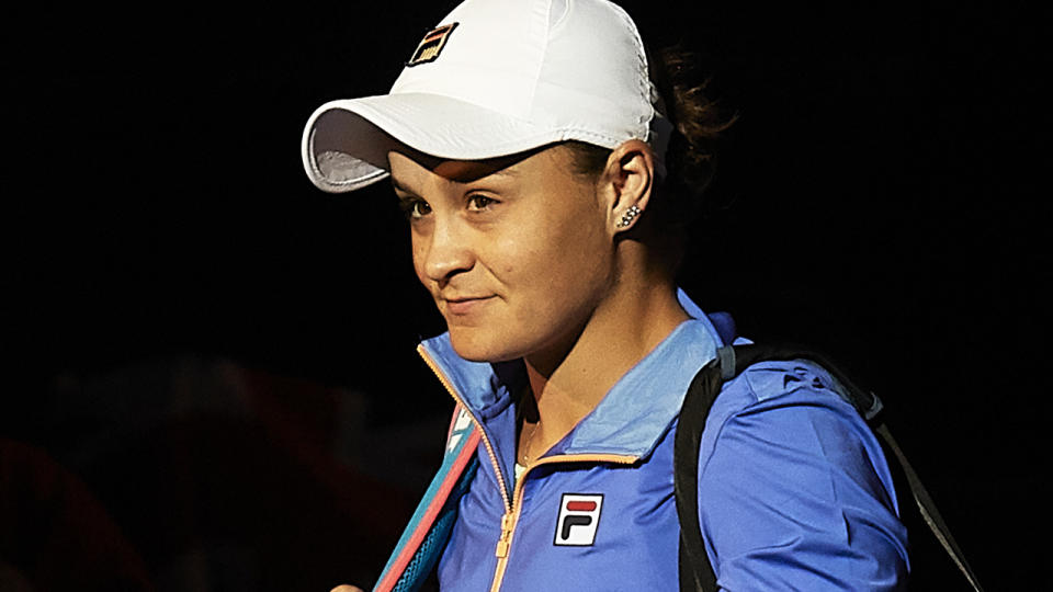 Ash Barty is pictured walking onto the court at the 2020 Qatar Open.