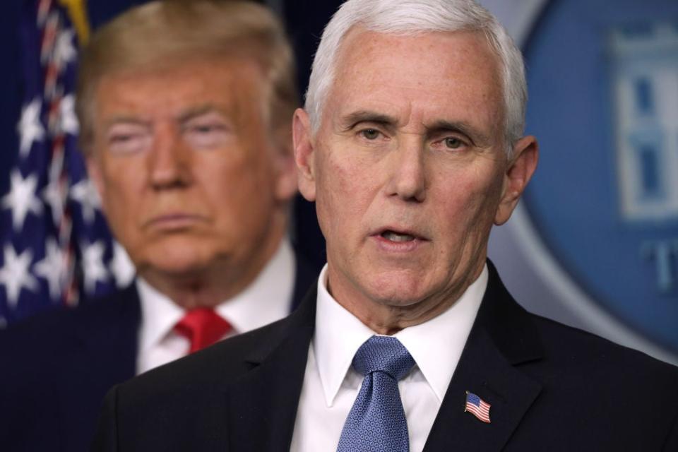 Mike Pence deleted a tweet praising Donald Trump's handling of the coronavirus as the official US death toll approaches 192,000. (Getty Images)