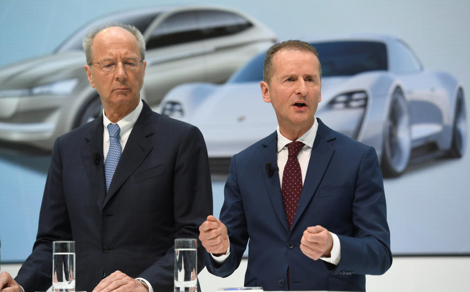 Volkswagen CEO Herbert Diess, right, and chairman Hans Dieter Poetsch address the media at the VW plant in Wolfsburg, Germany, in April. Photo: Fabian Bimmer/Reuters