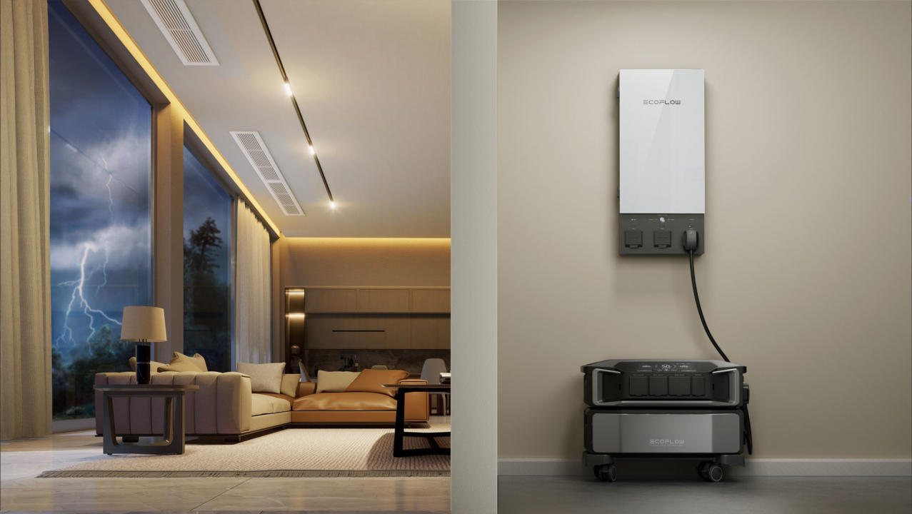 Lifestyle image of the Delta Pro Ultra on the floor of a posh house, with a wire leading up to the Smart Home Panel 2, indicating that the home is able to use battery backup. To the left, a window highlighting a lightning storm.