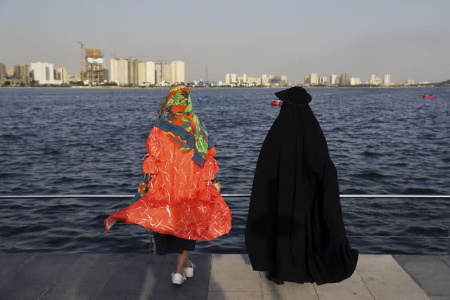 Women spend an afternoon around the Persian Gulf Martyrs’ Lake in Tehran