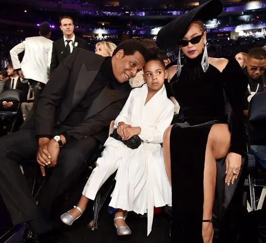 Kevin Mazur/Getty Beyoncé with Jay-Z and Blue Ive Carter at the Grammy Awards in 2018.