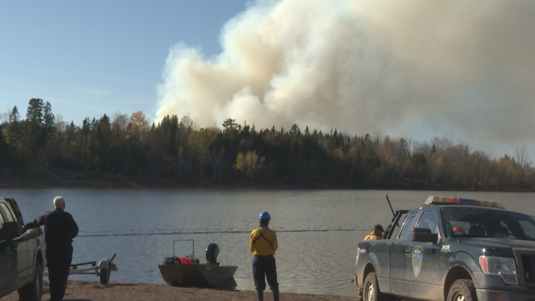 Wildfire burns out of control near Lakeville Corner, unreachable by trucks