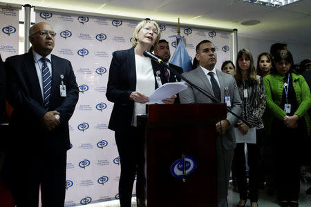 Venezuela's chief prosecutor Luisa Ortega Diaz (C) talks to the media during a news conference in Caracas, Venezuela May 24, 2017. REUTERS/Marco Bello