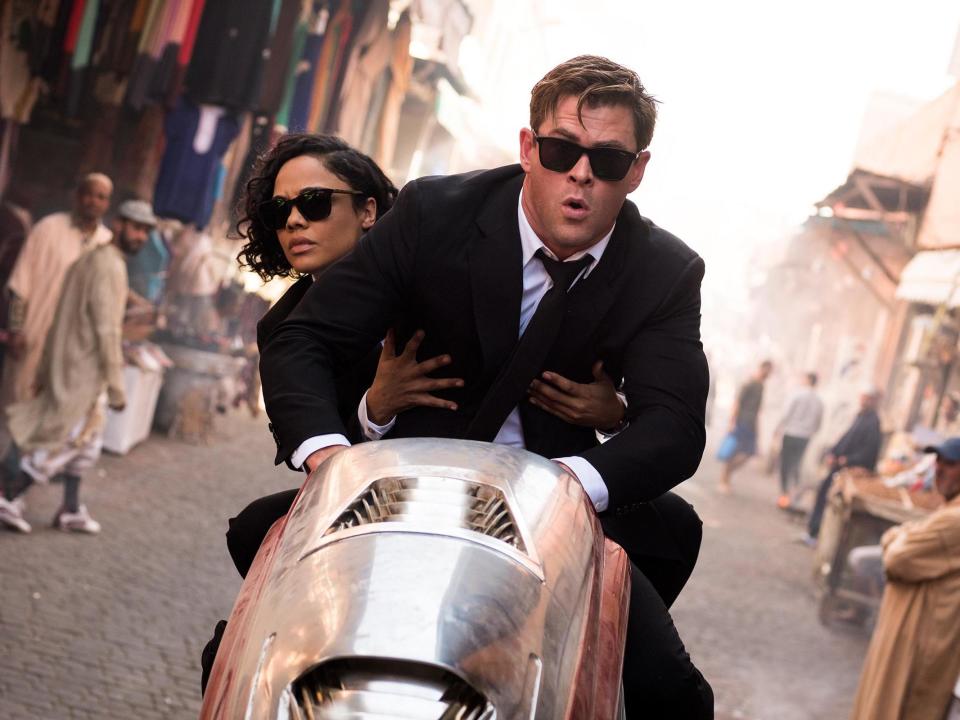 Dir: F Gary Gray; Starring: Tessa Thompson, Chris Hemsworth, Emma Thompson, Liam Neeson, Kumail Nanjiani (voice). Cert 12A, 115 minsThe latest Men in Black film, following seven years after the third film in the franchise and now with a new cast, is an enjoyable romp, which doesn’t take itself seriously at all.Like X Men: Dark Phoenix, the latest adventure is keen to qualify its own title. “Men in black?”, its heroine, Molly/Agent M (Tessa Thompson) asks sceptically early on. “Don’t start. I’ve had the conversation,” her boss Agent O (Emma Thompson) responds, making it very clear that the traditional gender bias in superhero films is fast becoming obsolete. As we are told several times, this is as much a film about women in black as it is about men.The special effects are wildly over the top and just a little bit cheesy. We have the Eiffel Tower glowing like a lava lamp, villains who can cause the ground itself to ripple and dissolve and heroes whose reaction to any given crisis is to reach for the biggest gun available. Chris Hemsworth plays Agent H in the same self-deprecating fashion as he does Thor in the Marvel movies. He may not have the hair, the Nordic flab or the hammer but he wisecracks away throughout the film. At times, as he rushes around in pursuit of the stolen weapon that can destroy the world, he is also like a more energetic version of Roger Moore’s James Bond.Part of the schtick here is that Agent H is continually upstaged by his smarter partner, Agent M. He sits in the driver’s seat and tries to call the shots but she is generally a step ahead of him. Thompson plays Agent M in tongue in cheek fashion, an action heroine far more reliant on wit and ingenuity than on brawn. The most compelling fights are between the two of them as they strive to upstage one another. As in old screwball comedies, the more they bicker, the more apparent their mutual attraction becomes.Liam Neeson – who was embroiled in a racism controversy earlier this year – is well cast as the big boss, High T, delivering the most corny lines with his familiar Moses-like gravitas and acquitting himself well in his occasional action scenes too. There is strong support from Rare Small as the smirking, desk bound Agent C, who is both jealous of Agent H’s feats in the field and deeply suspicious of his methods.Director F Gary Gray (whose very varied previous credits include Straight Outta Compton and Fast & Furious 8) is far more interested in serving up harum-scarum action and comedy than in providing a smoothly grained storyline. There are lots of bumps in the road here and many random shifts in both tone and location.The film opens in Paris in 2016 with High T and Agent H taking on the shape shifting aliens from the Hive on top of the Eiffel Tower. The story then lurches back 20 years in time to Brooklyn, where Molly, a precocious young kid who reads Stephen Hawking books instead of comics, catches her first glimpse of the Men in Black. She is determined to join their ranks. This, though, is a shadowy organisation with very particular recruitment methods. It takes Molly fully two decades to wheedle her way into the outfit - and even then, she is only on probation. She is assigned to be H’s partner. He, though, prefers to work alone. He is the poster boy of the organisation but something is gnawing away at him. His traumatic experiences in Paris and his fiery romance with Riza (Rebecca Ferguson in Ab Fab mode), a slithery but very glamorous alien femme fatale with many arms, have somehow warped his personality.Plotwise, the film teeters on the edge of absurdity throughout. The main action concerns attempts to get hold of a tiny jewel-like ornament which can be transformed into the most powerful weapon in the universe.The filmmakers choose a strange mixture of humdrum and exotic locations for their big action set-pieces. An early shoot out takes place on a busy London street outside the local branches of Eat and All Bar One. However, we are quickly whisked from there to the Marrakech Souk and on to an exotic island castle somewhere in southern Italy. Along the way, H and M pick up a sidekick, a tiny little green, gremlin-shaped chess piece called Pawny (voiced by The Big Sick’s Kumail Nanjiani). His queen is dead and he pledges squeaky voiced allegiance to Molly instead.The screenplay by Art Marcum and Matt Holloway doesn’t pay much attention to the aliens. French dancers Laurent and Larry Nicolas Bourgeois play identical alien twins who are desperate to get hold of the secret weapon but we learn very little about them. Every so often, the Hive aliens will take over a human body and it will then be up to the men (and women) in black to zap it out of existence.One of the film’s most engaging traits is its absolute inanity. It is not trying to hold up a dark mirror to humanity and to make points about pollution, destruction or political persecution. Instead, the main intention is to serve up chases, slapstick and knockabout comedy. Many Hollywood blockbusters are dragged down by their own bombast but this film has a lightness and carefree quality throughout. It is also instantly forgettable. Audiences may feel as if they’ve been instantly “neuralysed” (the process by which the Men in Black erase people’s memories) after watching it but the experience is fun while it lasts.