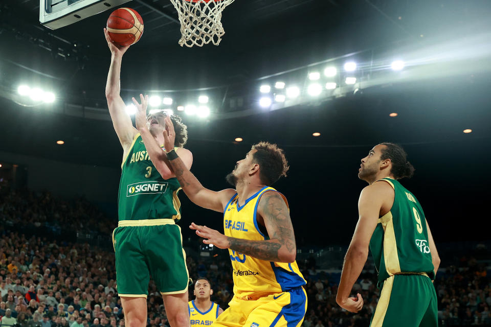 MELBOURNE, AUSTRALIA – AUGUST 16: Josh Giddey of Australia shoots during the match between the Australia Boomers and Brazil at Rod Laver Arena on August 16, 2023 in Melbourne, Australia. (Photo by Kelly Defina/Getty Images)