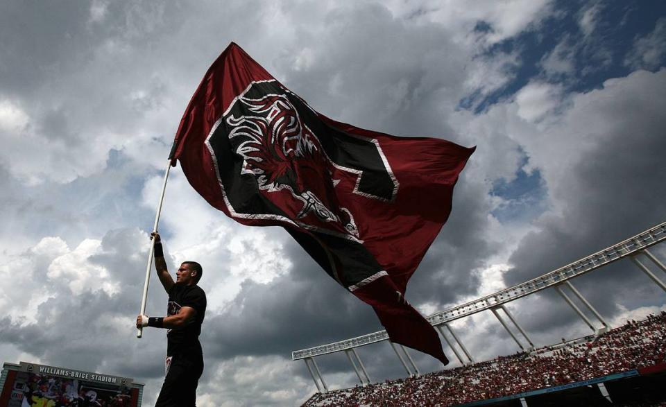 The University of South Carolina flag flies high after the Gamecocks scored against East Carolina in the third quarter at William-Brice Stadium.
