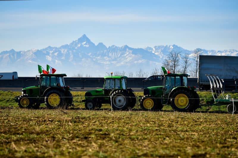 Farmers take part in a protest against EU agricultural policies organized by the Italian Farmers Committee in Rivoli, in land that runs next to the Sito interport and the ring road. Fabio Ferrari/LaPresse via ZUMA Press/dpa