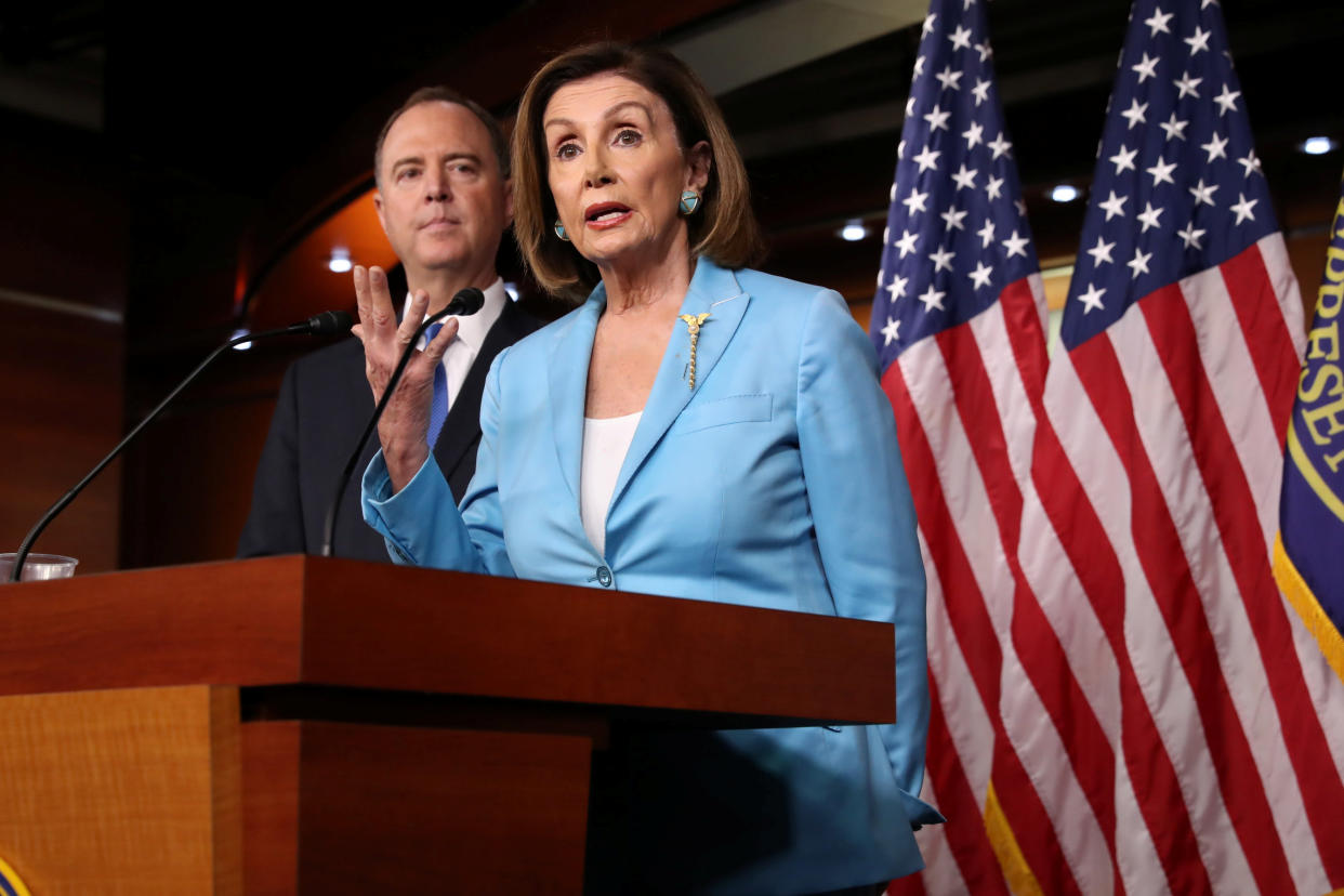 U.S. House Speaker Nancy Pelosi (D-CA) and House Intelligence Committee Chairman Adam Schiff (D-CA) address reporters during Pelosi's weekly news conference at the U.S. Capitol in Washington, U.S., October 2, 2019. REUTERS/Jonathan Ernst