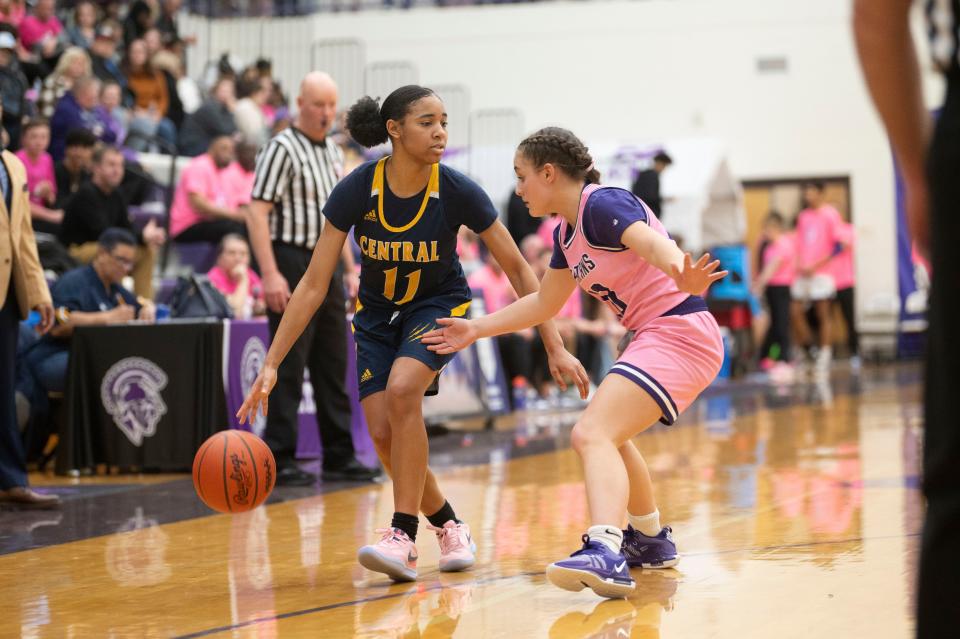 Battle Creek Central junior A'Mya Hodges is guarded by Lakeview sophomore Lilamae Frankduring a game at Lakeview High School on Friday, Feb. 23, 2024.